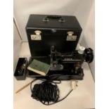 A VINTAGE 222K FEATHERWEIGHT SINGER PORTABLE ELECTRIC SEWING MACHINE WITH CASE, INSTRUCTIONS,