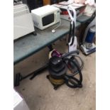 THREE VACUUM CLEANERS TO INCLUDE A BISSELL, AN AQUA VAC AND A HOOVER