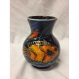 A HAND PAINTED ANITA HARRIS FISH VASE SIGNED IN GOLD