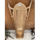 A VINTAGE WOODEN FOLDING IRONING BOARD