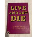 A HARDBACK EARLY RE-ISSUE DATED 1958 - LIVE AND LET DIE BY IAN FLEMING, WITH DUST JACKET. JONATHAN