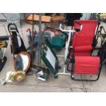 A LARGE ASSORTMENT OF ITEMS TO INCLUDE FOLDING GARDEN CHAIRS, AN EXERCISE BIKE AND GARDEN TOOLS ETC