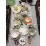 A NUMBER OF CERAMIC MUGS, SOUP DISHES AND A TEAPOT