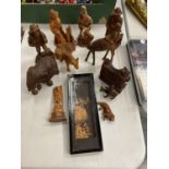 A QUANTITY OF ASIAN STYLE CARVED WOODEN FIGURES TO INCLUDE ANIMALS, MEN, WOMEN PLUS A FRAMED 3D