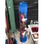 A SNOW BOARD WITH BINDINGS AND SKIS ETC