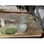 A QUANTITY OF GLASSWARE TO INCLUDE, AN ORNAMENTAL BASKET, CAKE STAND, FIVE HEAVY BOWLS AND SIX