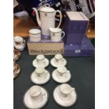 A WEDGWOOD HOUSES OF PARLIAMENT COFFEE SET TO INCLUDE 6 CUPS- 1A/F, 6 SAUCERS, A COFFEE POT, CREAM