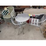 A METAL BISTRO SET COMPRISING OF ROUND TABLE AND TWO CHAIRS TO ALSO INCLUDE FOUR FURTHER CHAIRS WITH