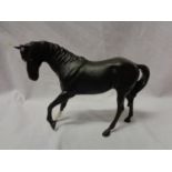 A BESWICK BLACK HORSE FIGURE