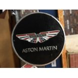 AN ASTON MARTIN CAST SIGN