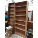 TWO WOODEN SHELVING UNITS/BOOKCASES