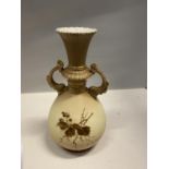 A BLUSH IVORY VASE DECORATED IN A FLORAL PATTERN HEIGHT 26CM
