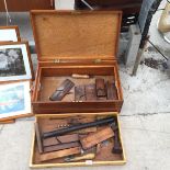 A VINTAGE WOODEN JOINERS CHEST WITH AN ASSORTMENT OF TOOLS TO INCLUDE A PUMP, WOOD PLANES AND