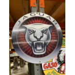 A JAGUAR ROUND METAL SIGN