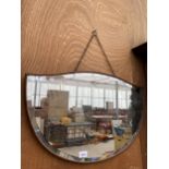 A WOODEN FRAMED ART DECO BEVELED EDGE MIRROR WITH CURVED DESIGN