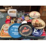 AN ASSORTMENT OF VARIOUS BRANDED PUB ITEMS TO INCLUDE TRAYS, GLASSES AND PUMP LABELS ETC