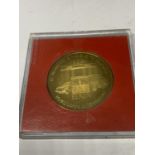 A BOXED SOLID BRONZE BRITISH MILITARY TRAIN MEDALLION