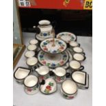 A POOTERY TEASET WITH FLORAL DESIGN TO INCLUDE, CUPS, PLATES, TEAPOT (NO LID), JUGS, SUGAR BOWL,