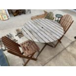 A WOODEN GARDEN PATIO SET TO COMPRISE OF A ROUND TABKLE AND THREE CHAIRS