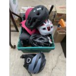 AN ASSORTMENT OF CYCLING HELMETS