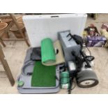 AN ASSORTMENT OF GOLF EQUIPMENT TO INCLUDE AN ELECTRIC GOLF CART, A PRACTICE PUTTING GREEN ETC