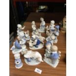 ELEVEN CONTINENTAL BLUE AND WHITE FIGURES OF CHILDREN