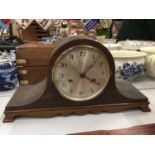 A NAPOLEONS HAT MAHOGANY CASED MANTLE CLOCK- WORKING AT TIME OF CATALOGING