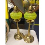 A PAIR OF VASALINE GLASS OIL LAMPS 35CM TALL
