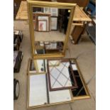 FOUR DECORATIVE GILT FRAMED MIRRORS AND A FURTHER FRAMED MIRROR
