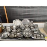 A LARGE ASSORTMENT OF STAINLESS STEEL KITCHEN ITEMS TO INCLUDE TRAYS, TEAPOTS, AND BOWLS ETC