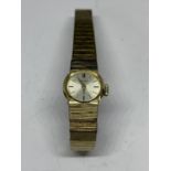 A GOLD PLATED SEIKO WRISTWATCH SEEN WORKING BUT NO WARRANTY