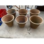 SIX LARGE MATCHING TERRACOTTA PLANT POTS