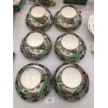 A SET OF SIX CROWN STAFFORDSHIRE TRIOS IN AN ORIENTAL STYLE