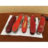 A COLLECTION OF FIVE SWISS ARMY STYLE POCKET KNIVES