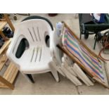 A FOLDING WOODEN DECK CHAIR AND A QUANTITY OF PLASTIC GARDEN CHAIRS