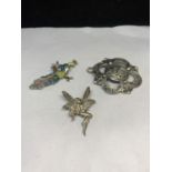 THREE WHITE METAL BROOCHES TO INCLUDE A PEACOCK AND A FAIRY EXAMPLE