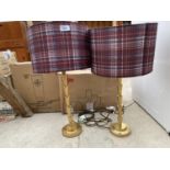 A PAIR OF GILT LAURA ASHLEY TABLE LAMPS WITH SHADES