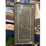 A FRAMED ORIENTAL TAPESTRY PANEL SIZE 67CM X 34CM