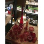 A LARGE COLLECTION OF CRANBERRY GLASS TO INCLUDE VASES, JUGS POTS ETC