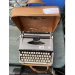 A RETRO CASED BROTHER TYPEWRITER