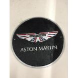 AN ASTON MARTIN CAST SIGN