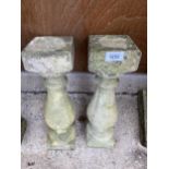 A PAIR OF RECONSTITUTED STONE TURNED COLUMN PEDESTAL BASES/PLANT STANDS