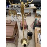 AN ASSORTMENT OF BRASS ITEMS TO INCLUDE A COAT STAND, A COAL BUCKET AND FIRESIDE ITEMS ETC