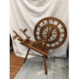 A VINTAGE STYLE WOODEN SPINNING WHEEL