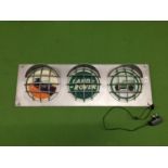 A LARGE LAND ROVER ILLUMINATED TRAFFIC LIGHT STYLE SIGN WITH HEADLIGHT DESIGN SIZE 36.5 INCHES/