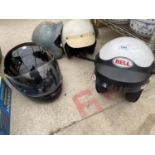 FOUR VINTAGE MOTORCYCLE HELMETS TO INCLUDE A BELL