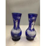A PAIR OF MARY GREGORY BOHENIUM HAND ENAMELLED BLUE GLASS VASES 20CM TALL