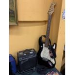 A SQUIER STRAT ELECTRIC GUITAR AND A SQUIER SP10 AMPLIFIER