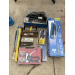 AN ASSORTMENT OF TOOLS TO INCLUDE AN ELECTRIC SANDER, DRILL BITS AND A TILE CUTTER ETC