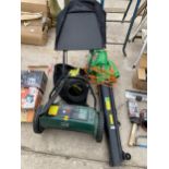 AN ELECTRIC GARDEN SCERIFIER, A RYOBI ELECTRIC CHAINSAW AND A LEAF BLOWER ETC